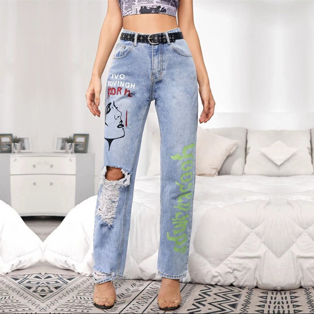 Stylish Black Distressed Denim Pants with Graphic Prints